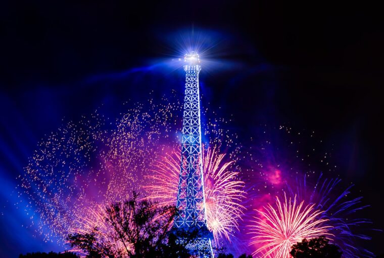 photo of eiffel tower with fireworks background